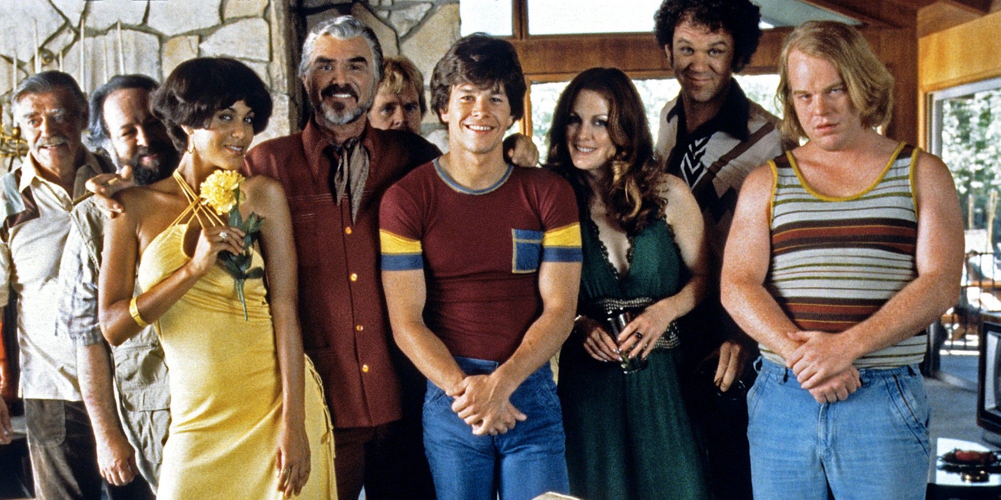 Julianne Moore, Mark Wahlberg, Philip Seymour Hoffman, William H. Macy, John C. Reilly, Burt Reynolds, Ricky J, Nicole Ari Parker and Jack Wallace in Boogie Nights