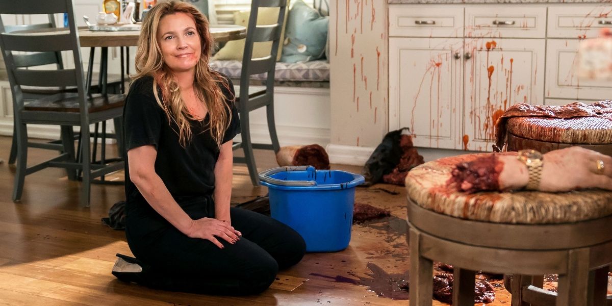 Woman smiling while removing corpse