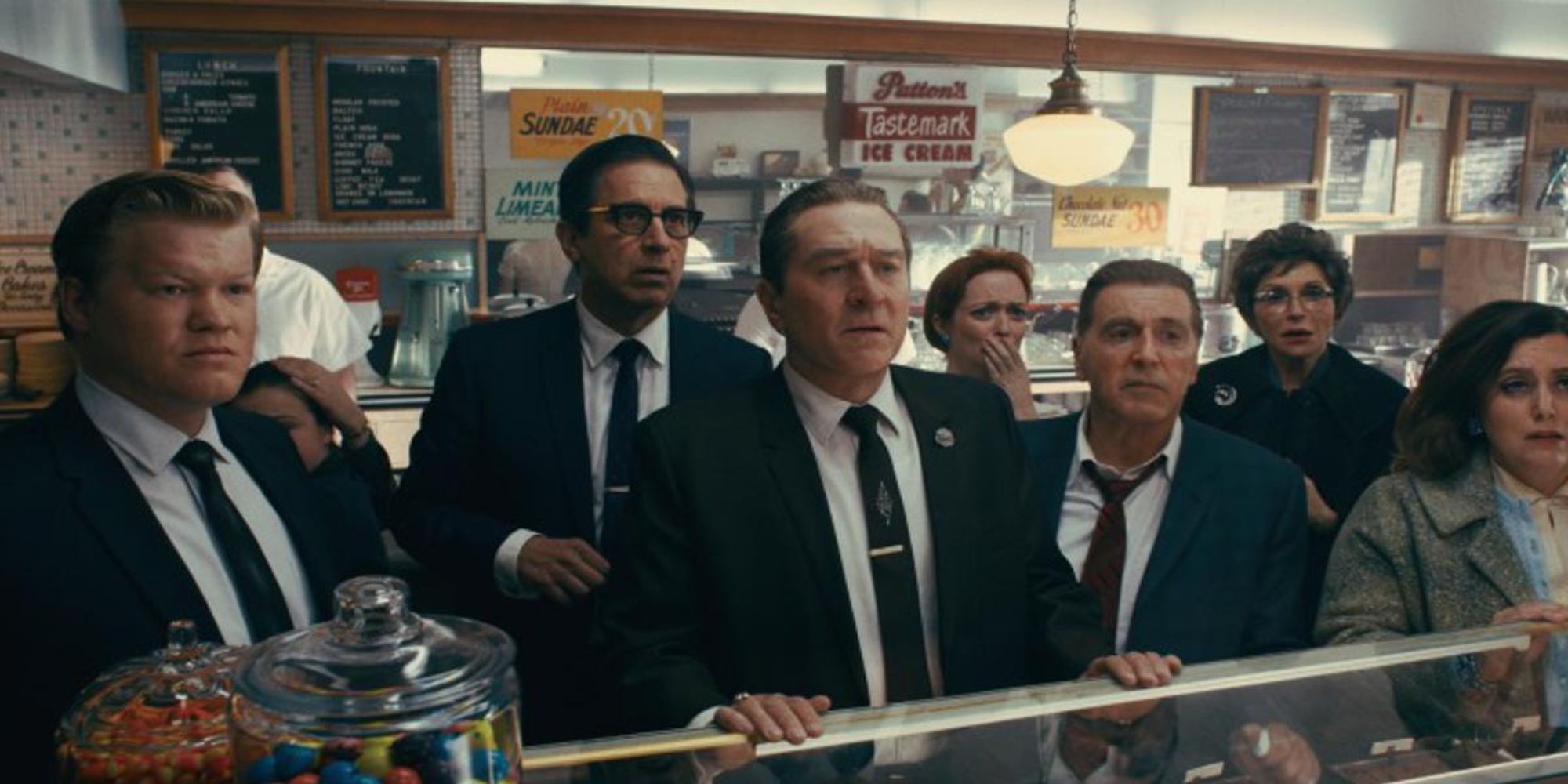 Group watching TV in a store