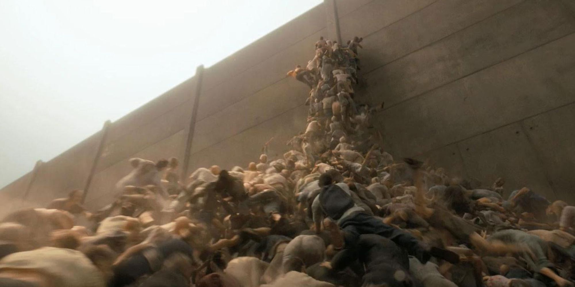 A zombie horde climbs the walls of fortified Israel in World War Z