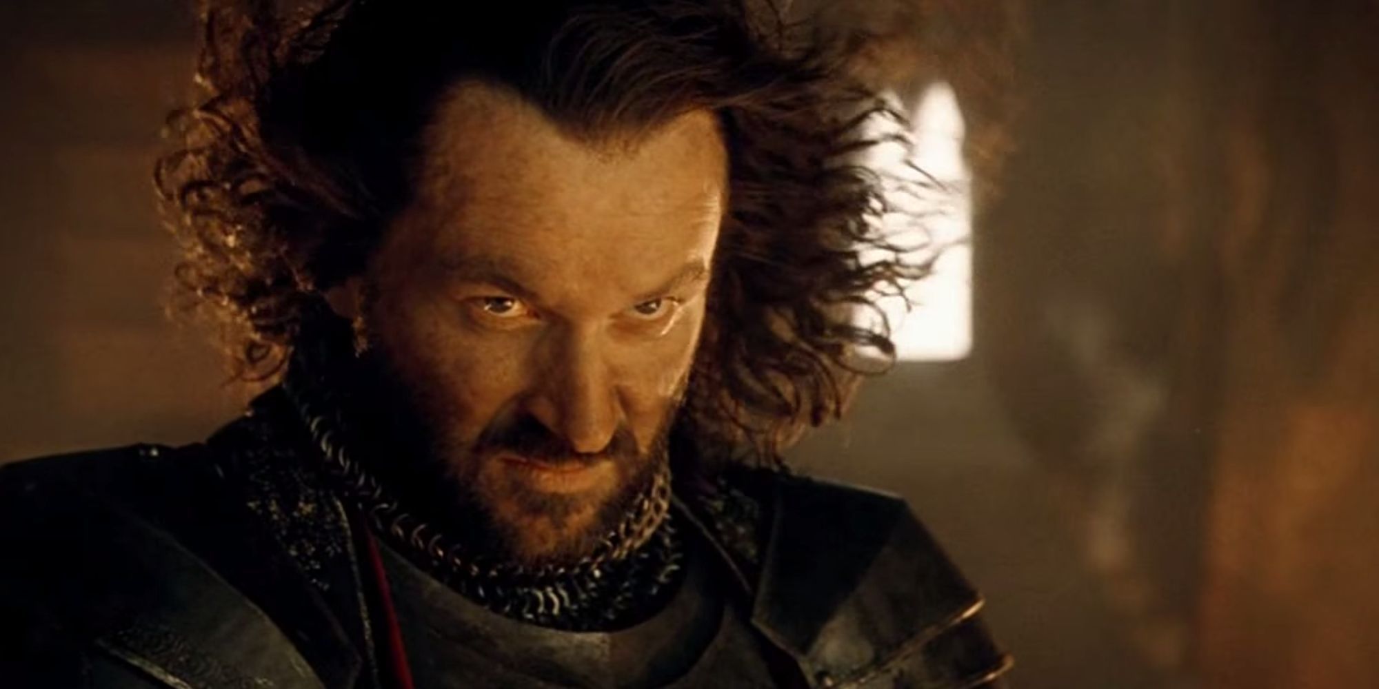 Isildur stands in the Furnace of Mount Doom