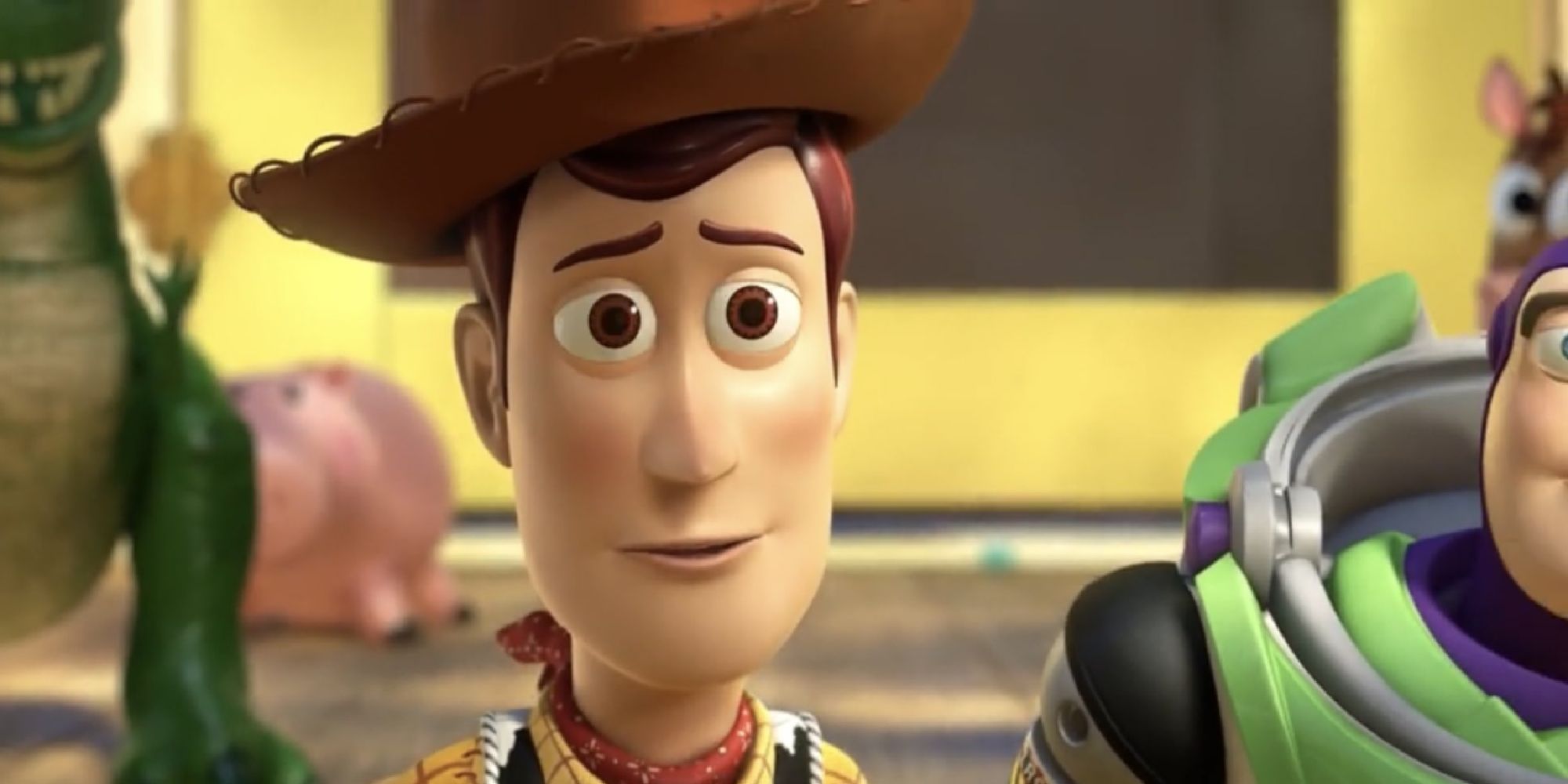 Woody and the toys watch Andy leave