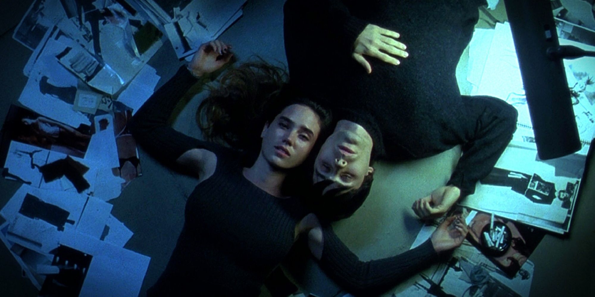 Harry and Marion lie on the floor in Requiem for a Dream.