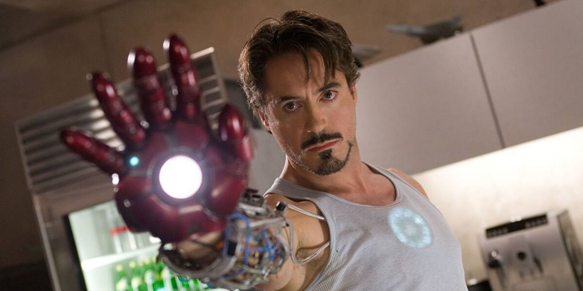 Tony Stark (Robert Downey Jr.) fires his repulsor in Iron Man (2008).