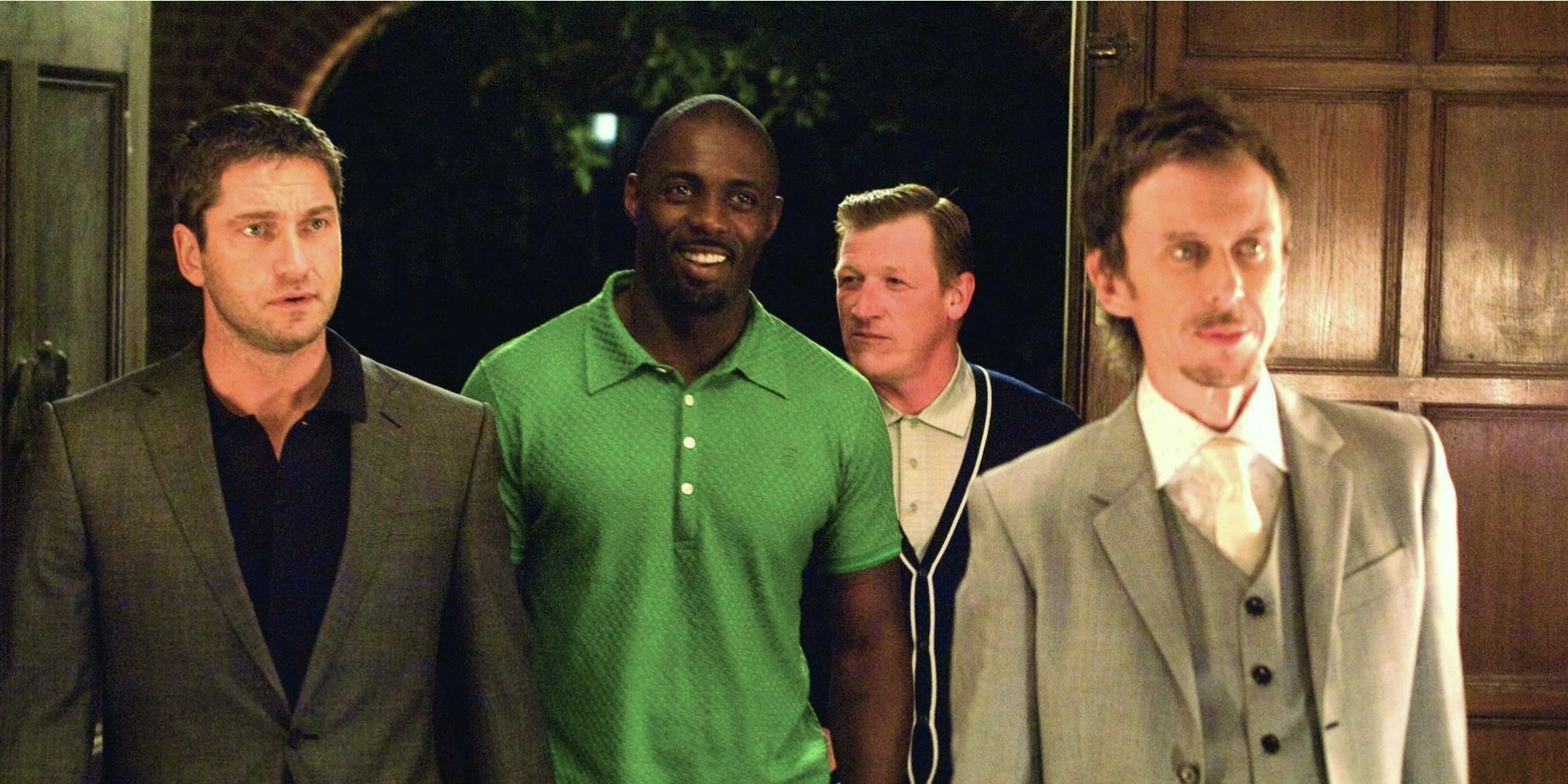 Four men enter the house through the front door