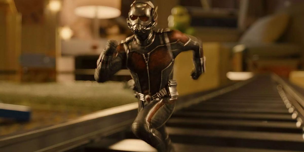Ant-Man running on the railroad tracks