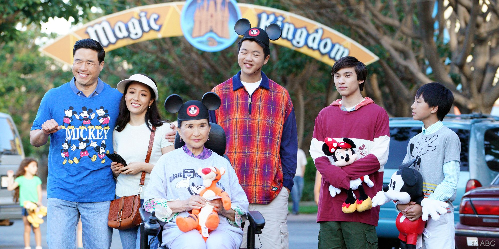 The characters from Fresh off the Boat dressed up in Magic Kingdom.