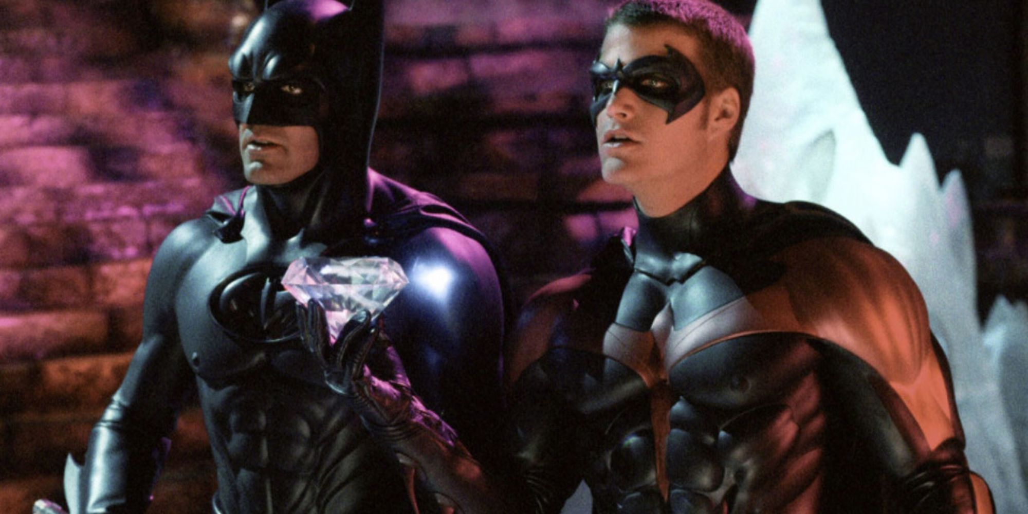 George Clooney and Chris O'Donnell as Batman and Robin face the same direction in Batman & Robin.