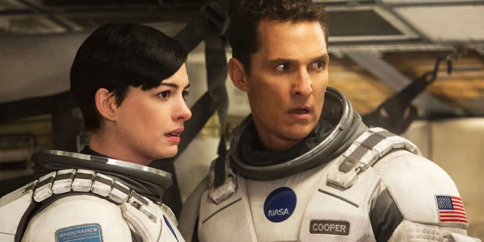 Anne Hathaway as Brand next to Cooper in Interstellar.