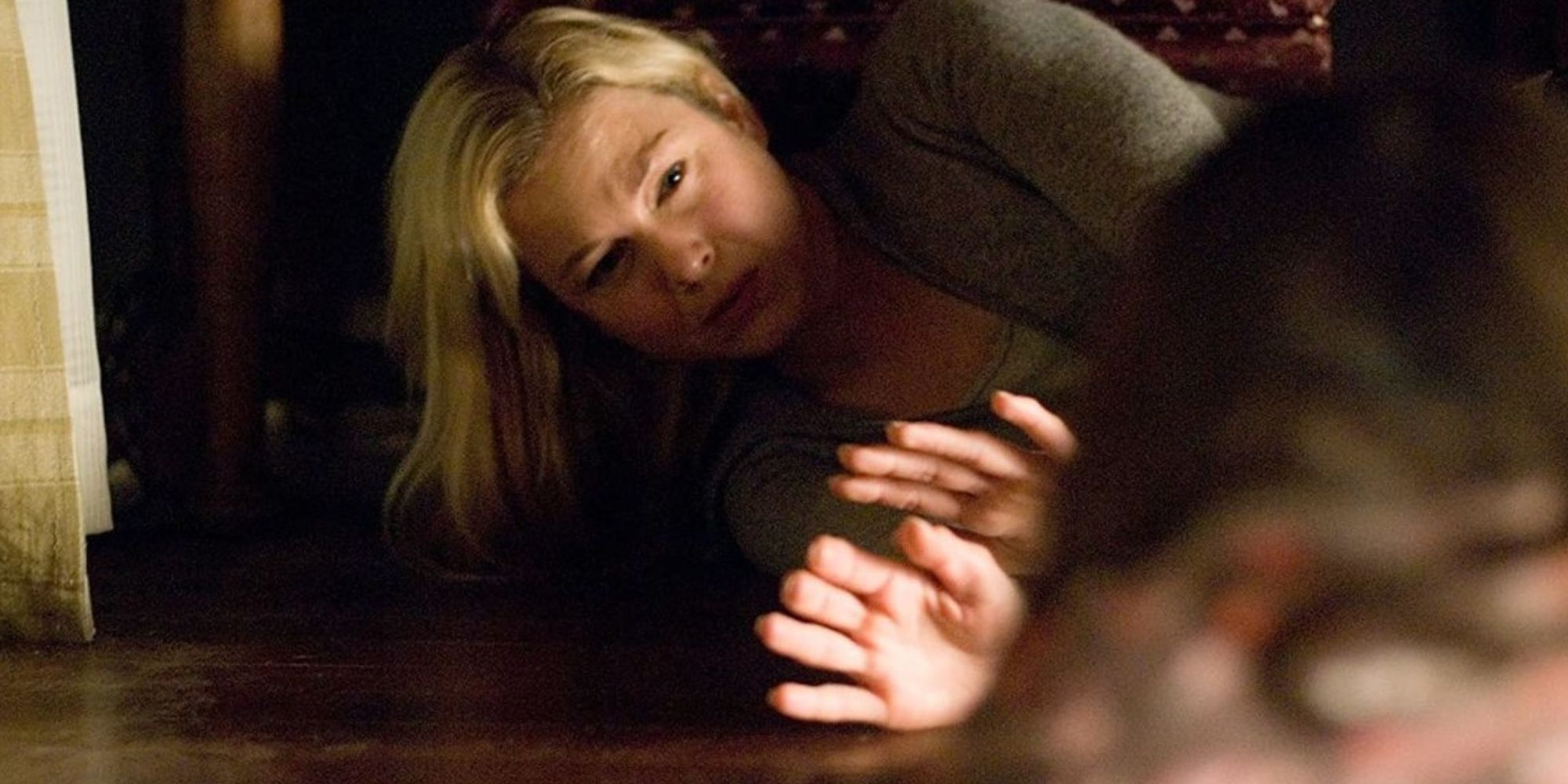 Mother hides under furniture, afraid of the child