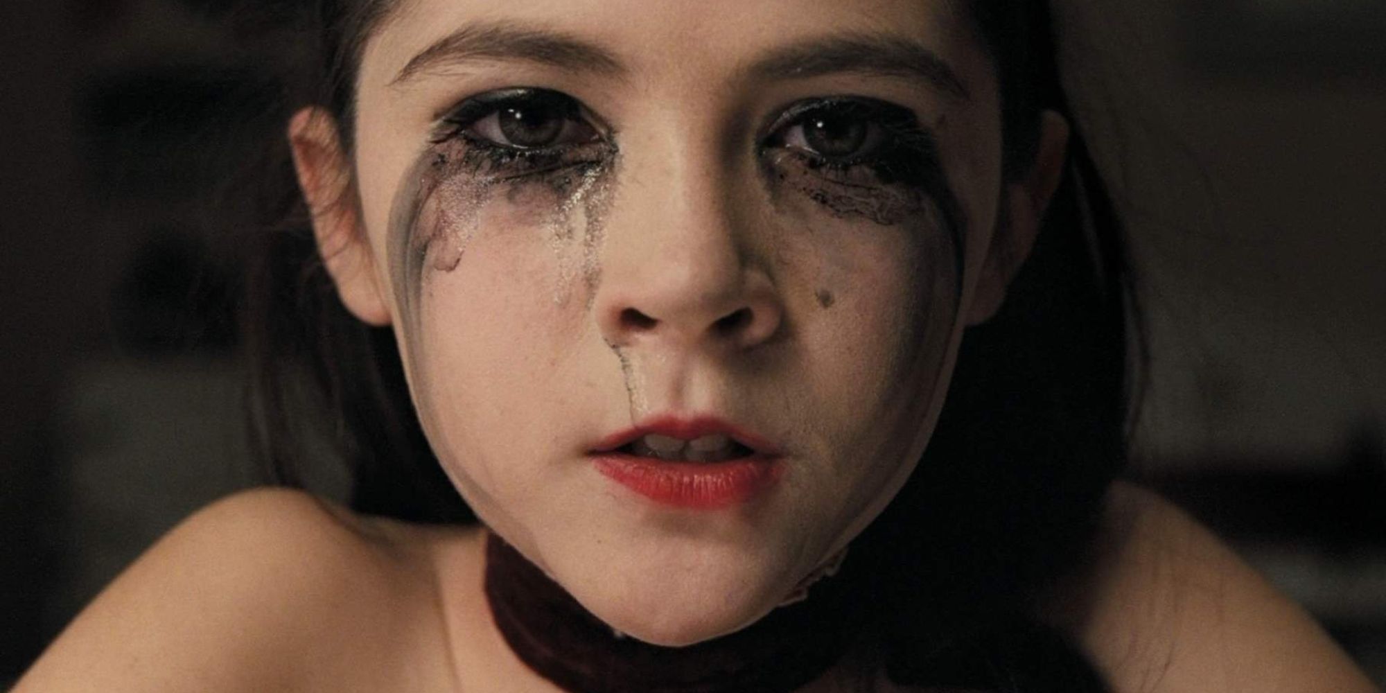 Esther is crying with black makeup on his face