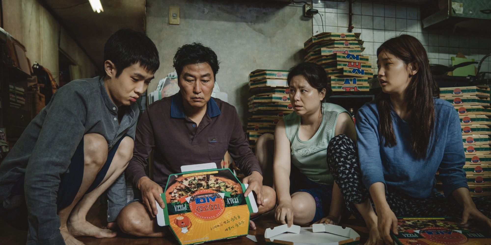 Choi Woo Shik, Song Kang Ho, Jang Hye Jin and Park So Dam in 'Parasite'