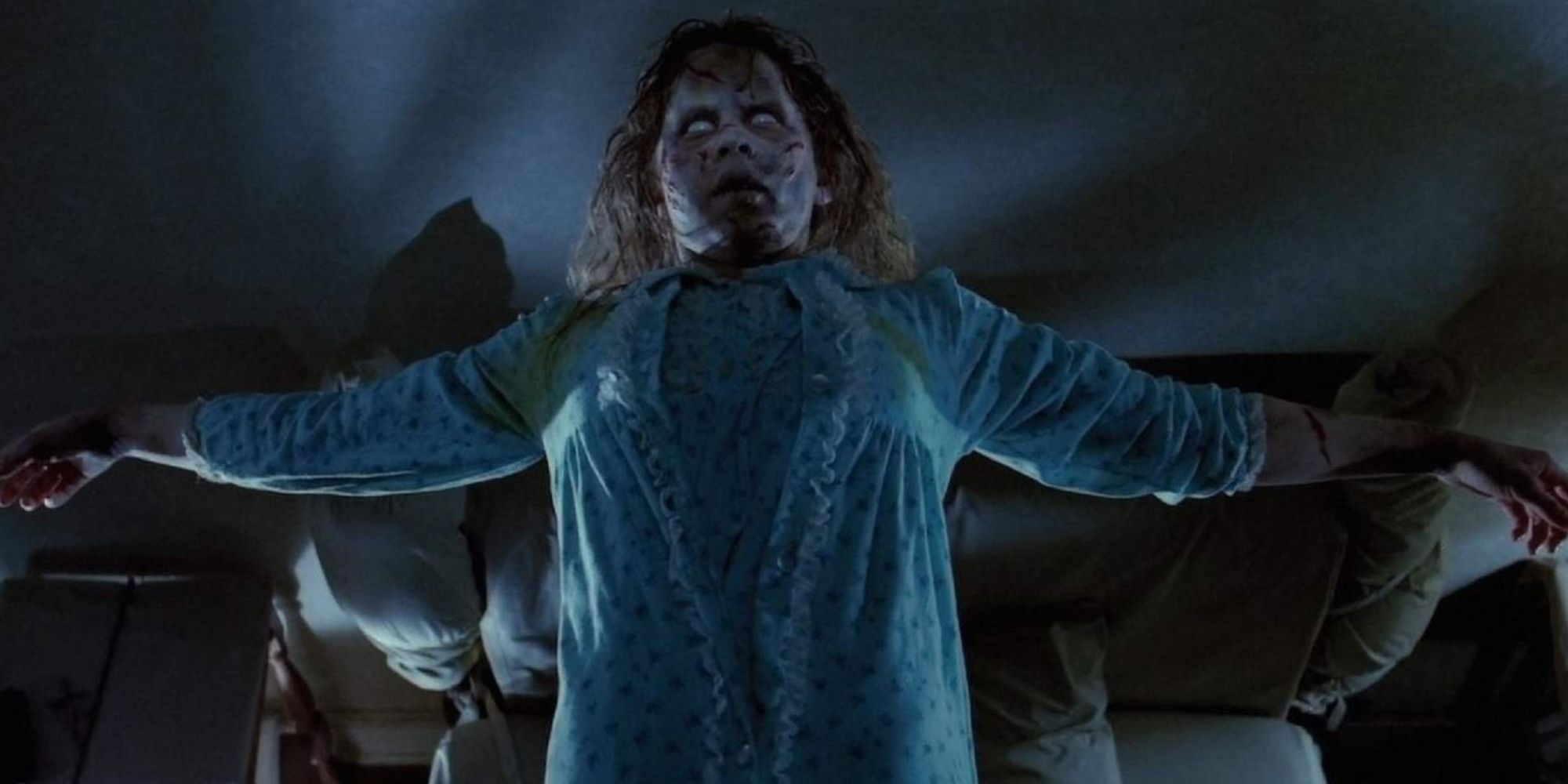 Regan, floating in the air, possessed