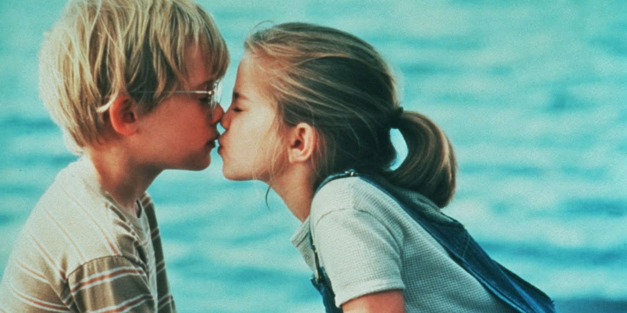 Anna Maria Chlumsky's friends Wada and Macaulay Culkin's Thomas sit by the water