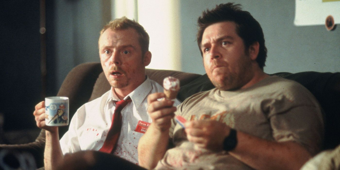 Simon Pegg and Nick Frost watch TV in Shaun of the Dead.