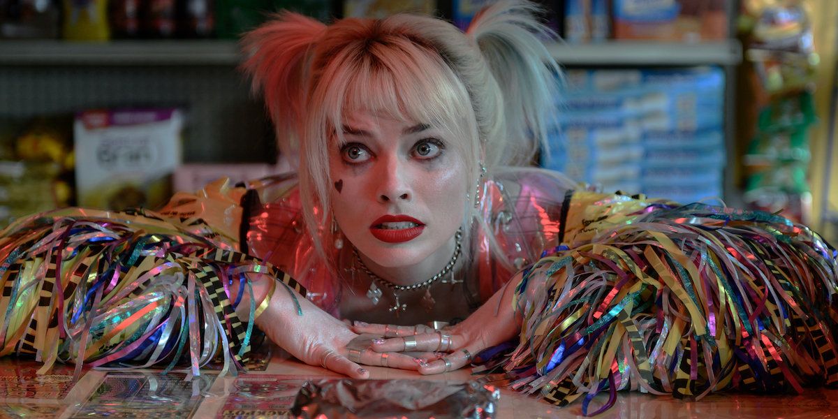 Harley Quinn looks hopefully at something off-screen in Birds of Prey.