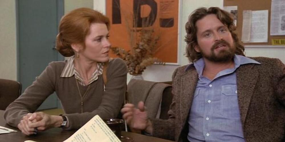Kimberly and Richard are in the office talking to someone off-screen in China Syndrome.