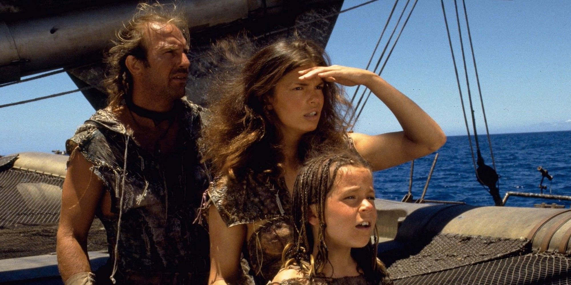 Kevin Costner, Jeanne Tripplehorn and Tina Majorino in Water World (1995)