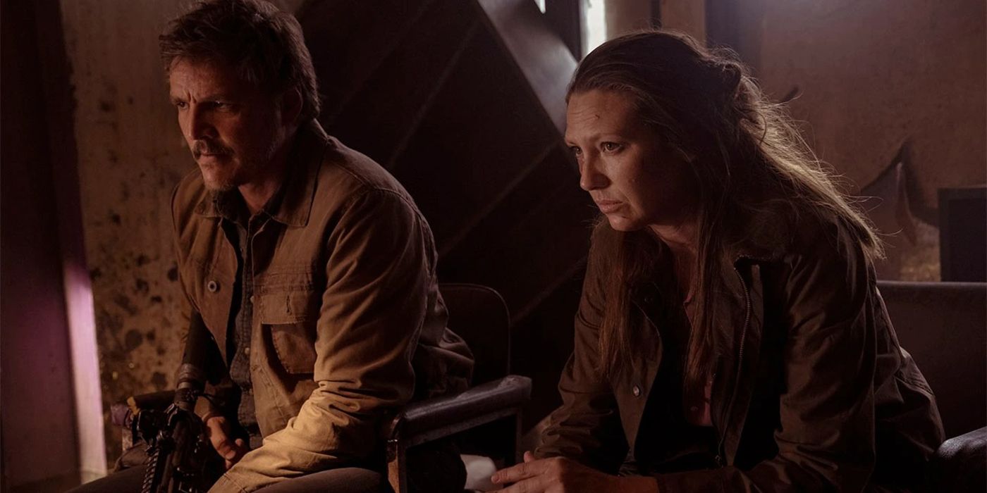 Pedro Pascal as Joel and Anna Torv as Tess sit side by side in The Last of Us.