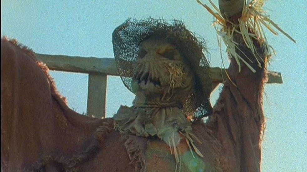 creepy scarecrow in 