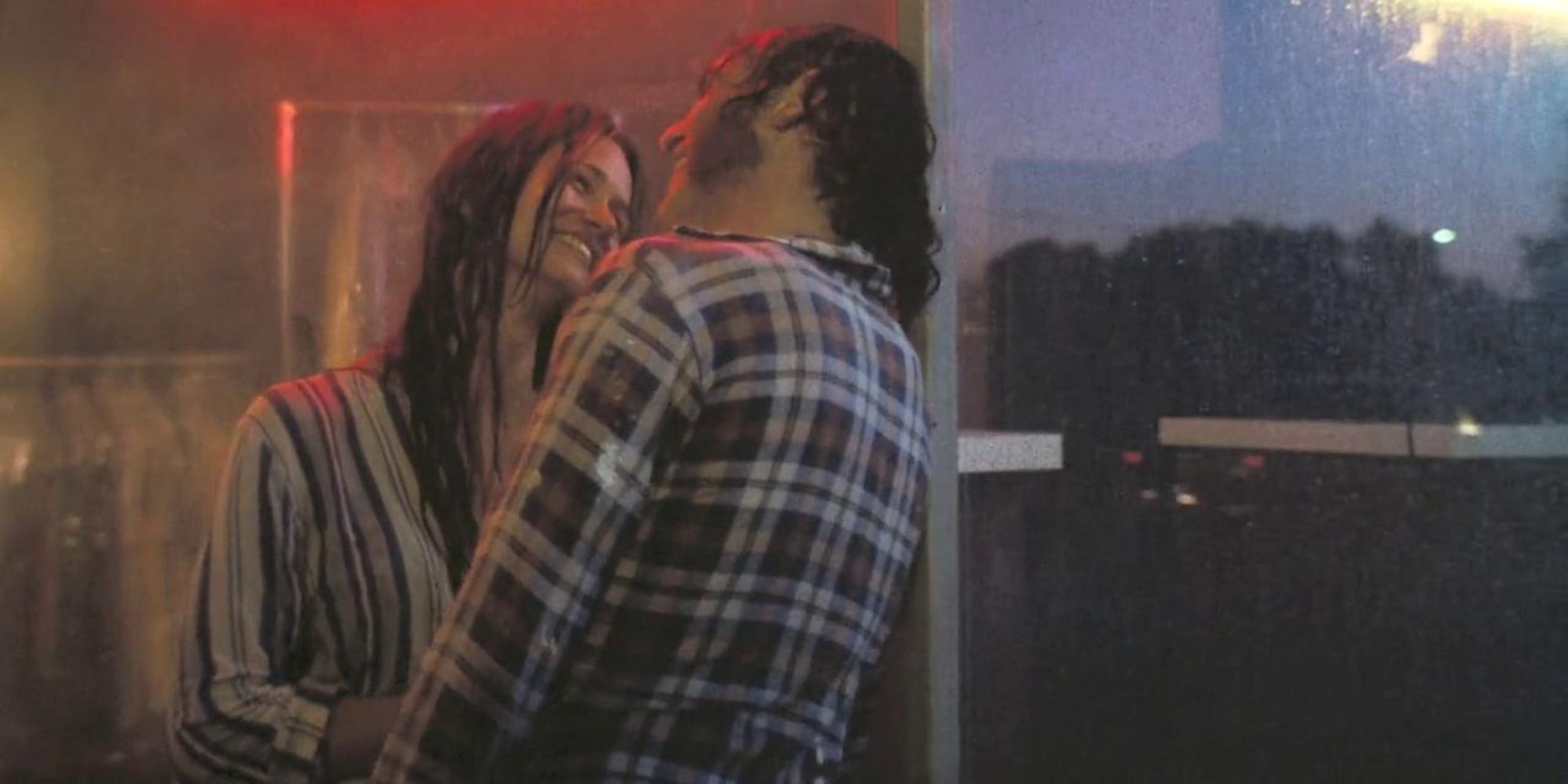 Shashta and Doc smile in the rain in 