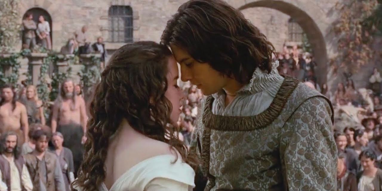 The young prince and his beloved embrace.