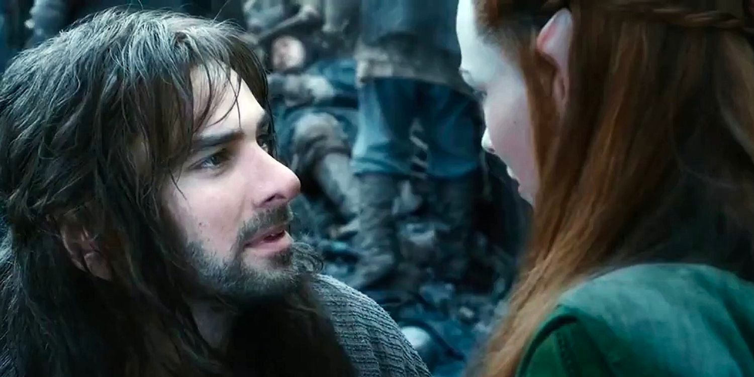 The dwarf and the elf look at each other longingly.