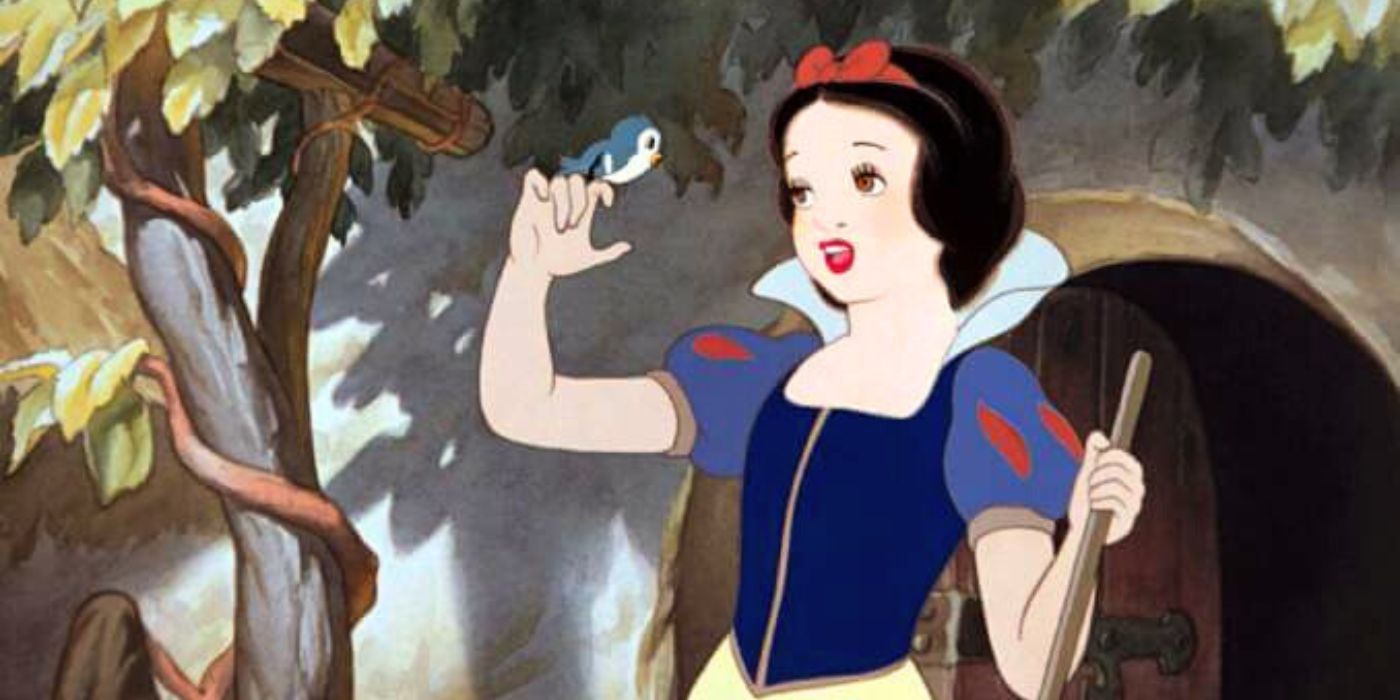 Snow White sings to a bird on her finger in Snow White and the Seven Dwarfs, 1937.