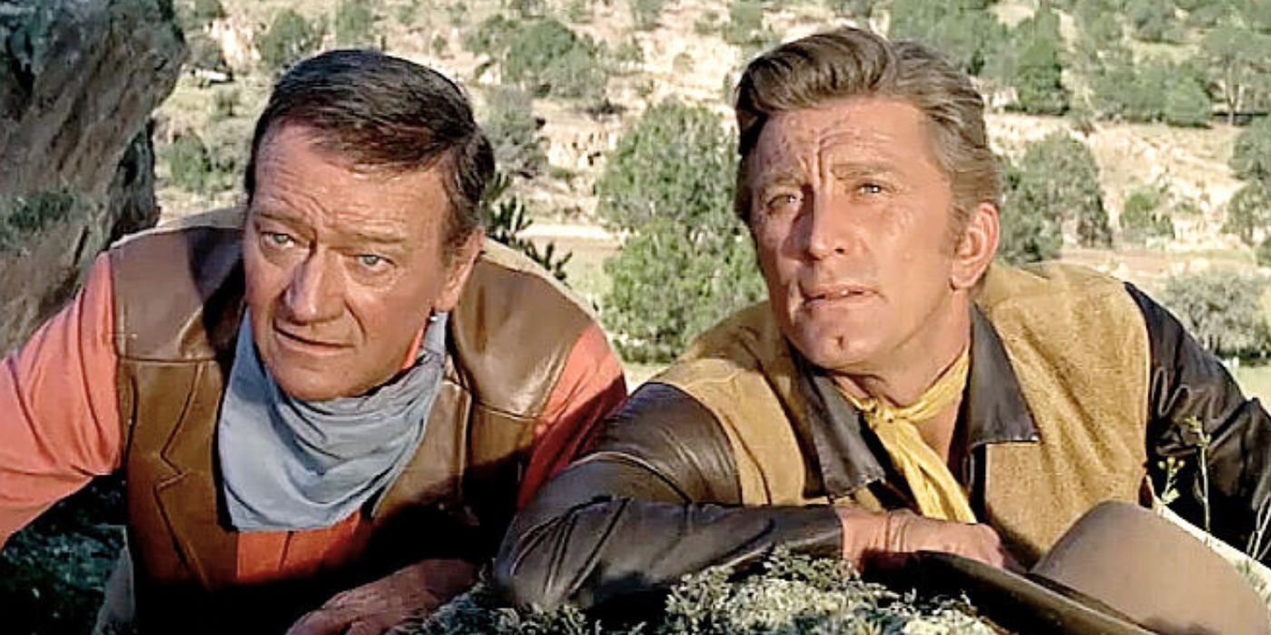 John Wayne and Kirk Douglas sat down behind the rocks in the Military Wagon.