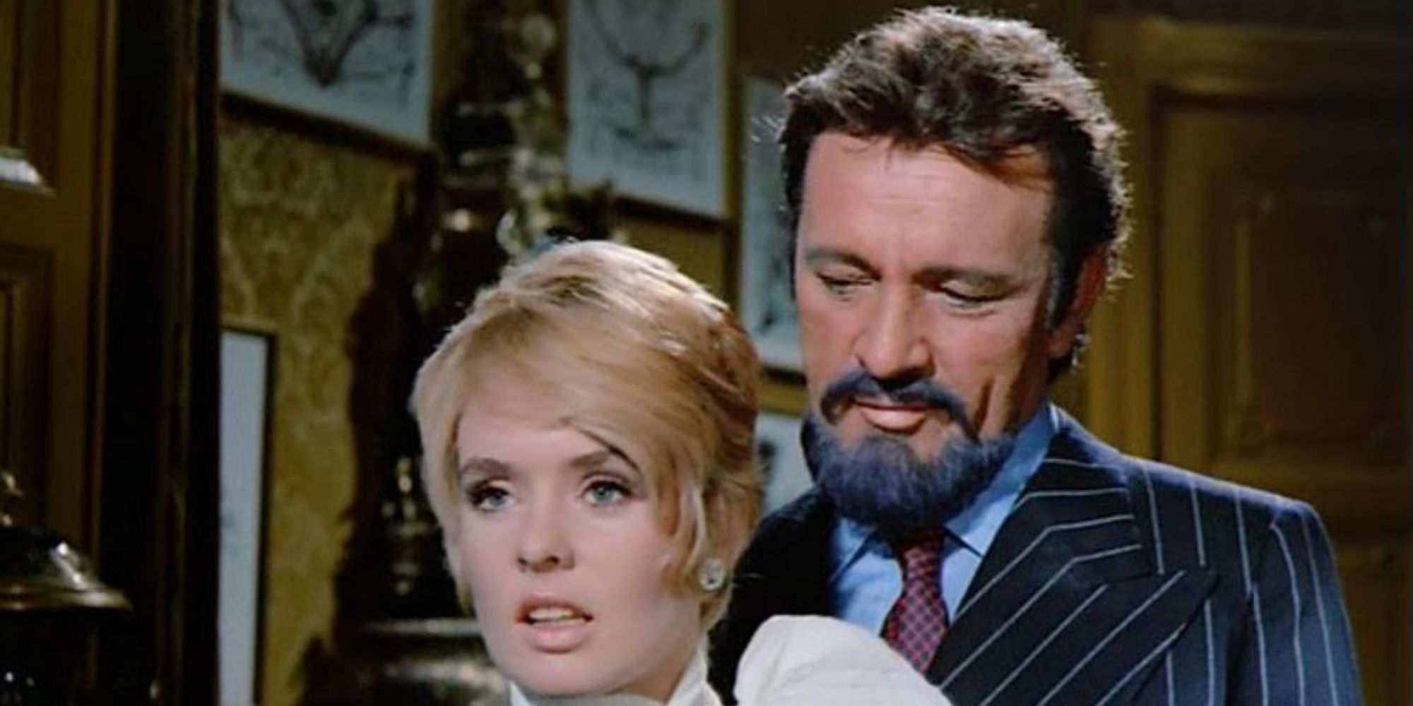 Bluebeard approaches his wife from behind