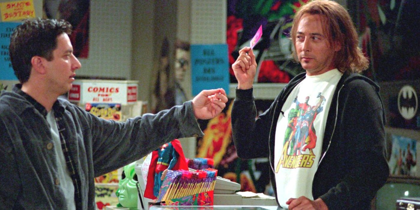 Ray Romano reaches out for something to Paul Reubens in Everybody Loves Raymond.