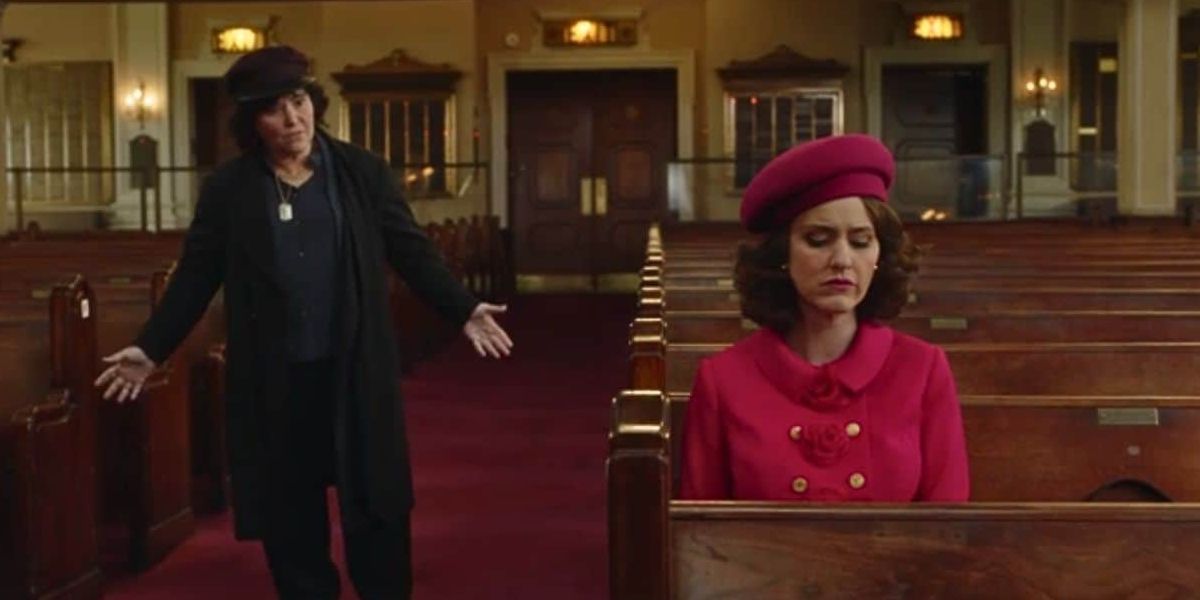 Midge (Rachel Brosnahan) confronts Susie (Alex Borstein) after Joel (Michael Zegen) is arrested.