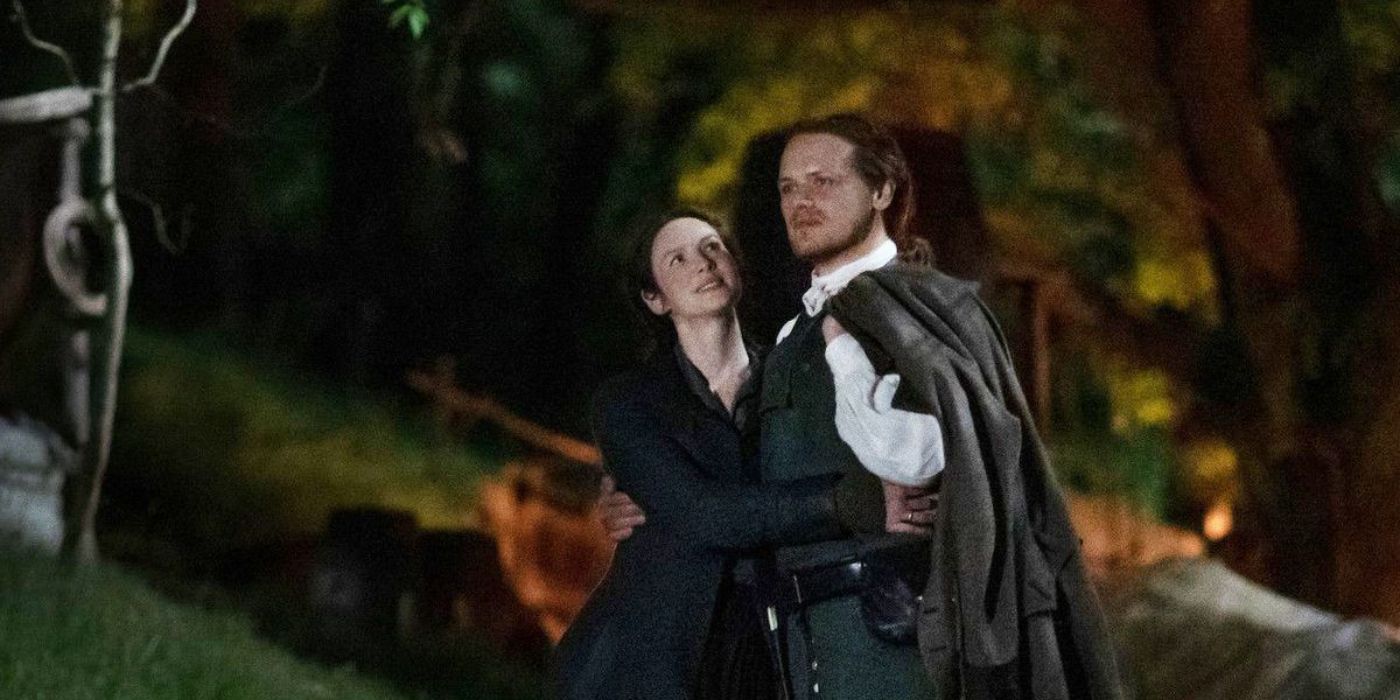 Claire, played by Caitriona Balfe, is held by Jamie, played by Sam Heughan, in Outlander season 5, episode 4.